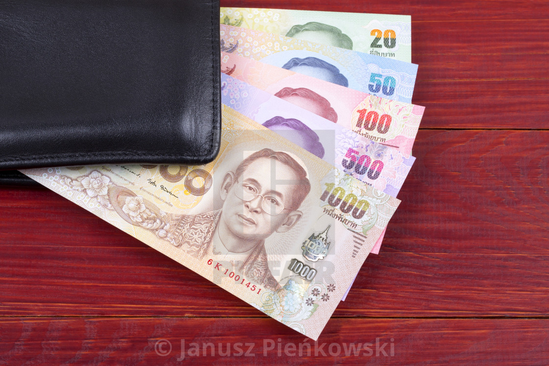 "Money from Thailand in the black wallet" stock image