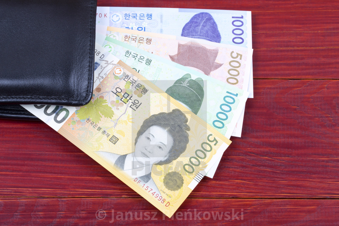 "South korean money in the black wallet" stock image