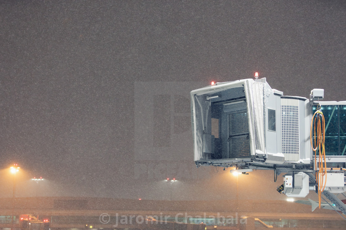 "Winter frosty night at airport during heavy snowfall" stock image