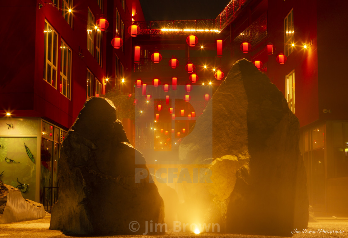 "Chinese lanterns behind rocks and mist" by Jim Brown - $22.49 "Chinese lanterns behind rocks and mist" stock image