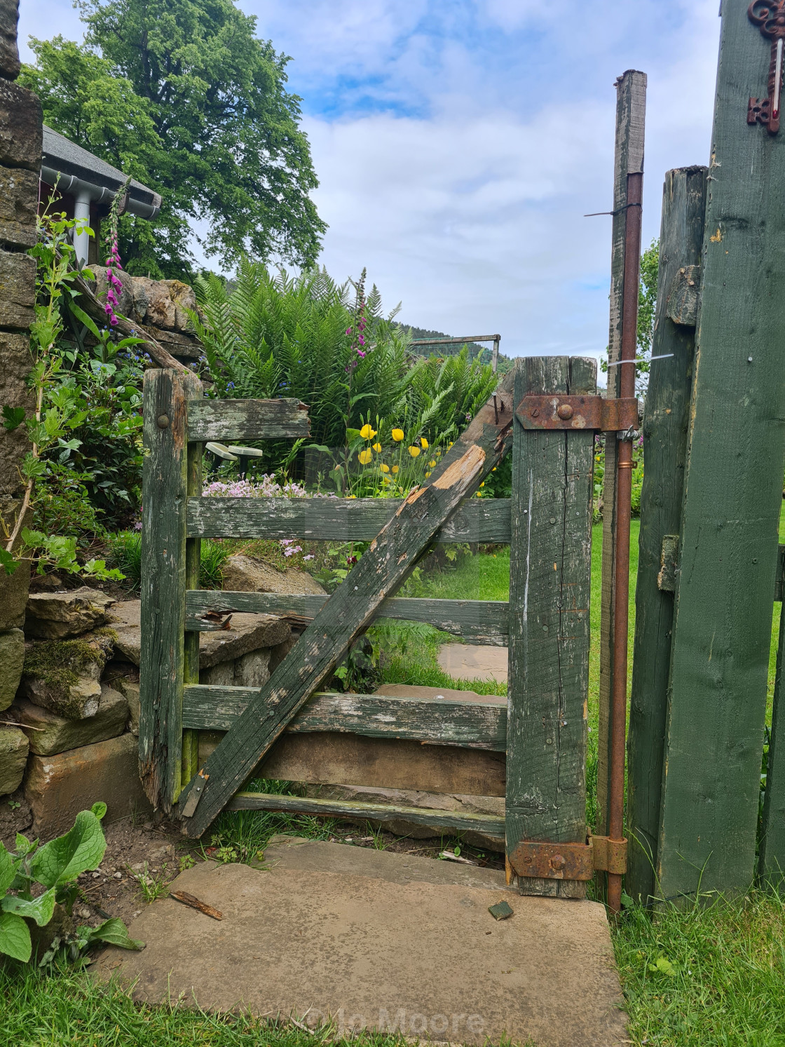 "Take a step through the gate" stock image