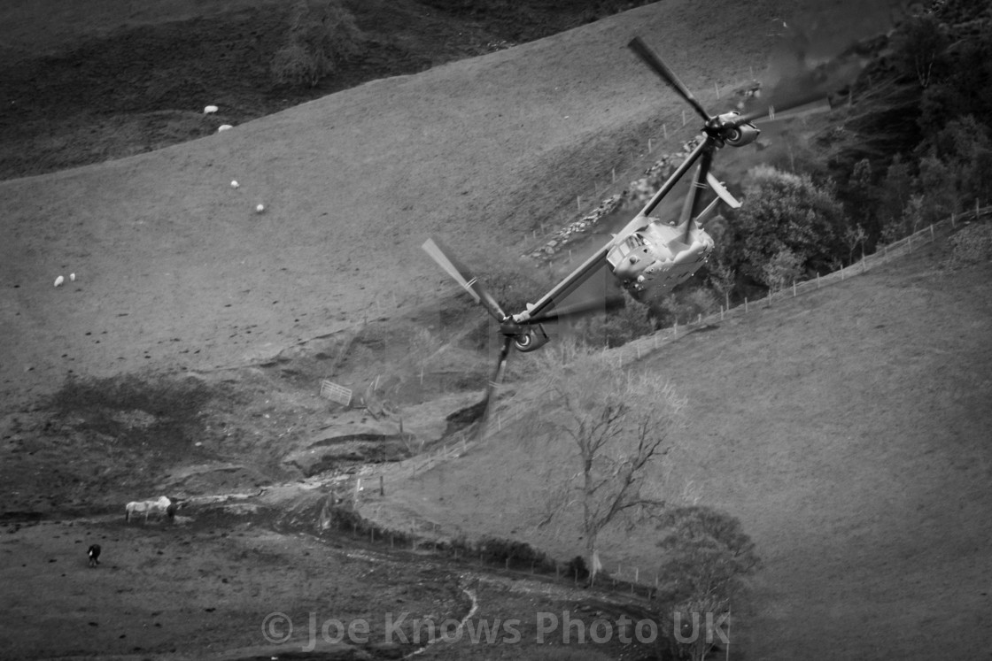 "V22 Osprey in Mach Loop LFA7 - Tail 0064 - through Bluebell and Bwlch" stock image