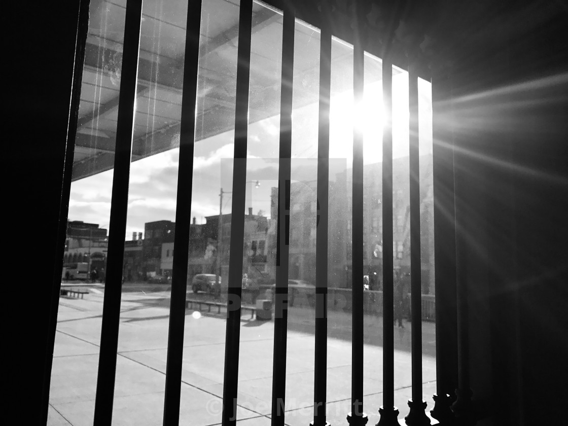 "Light through bars..." stock image