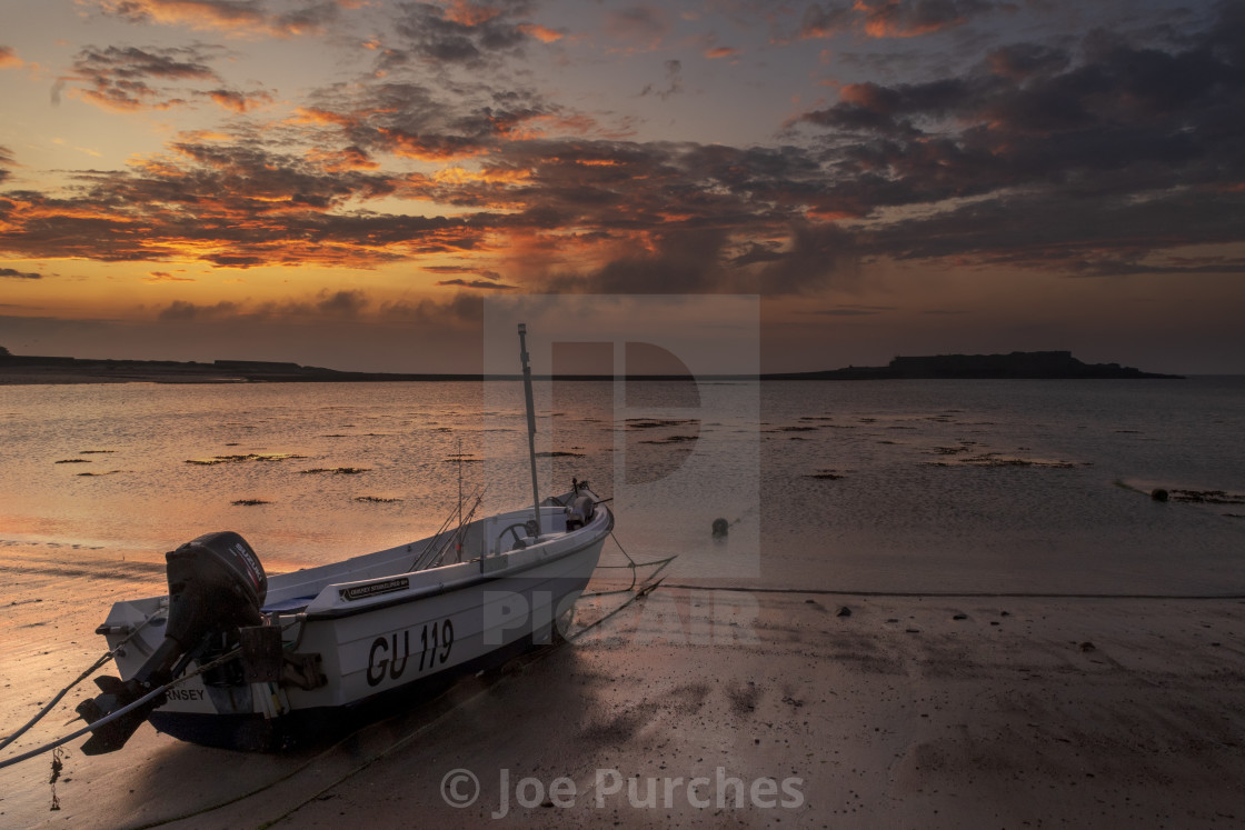 "Dawn Fishing boat at Longis beach, alderney" stock image