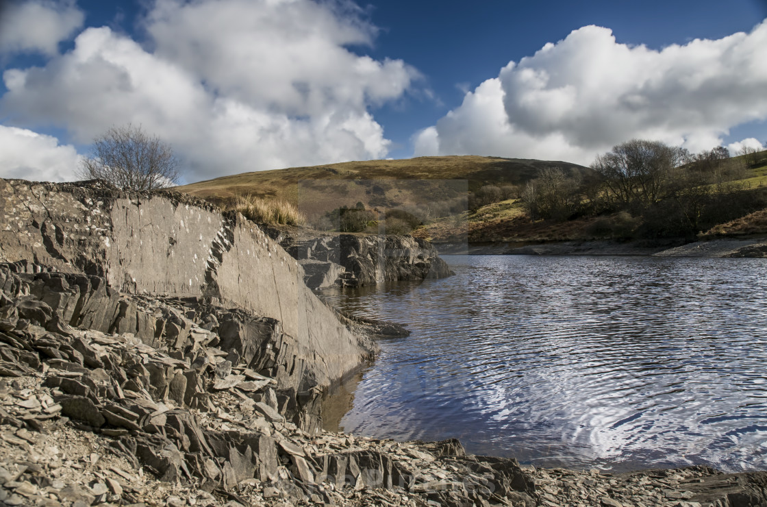 "Llyn Clywedog slate and water" stock image