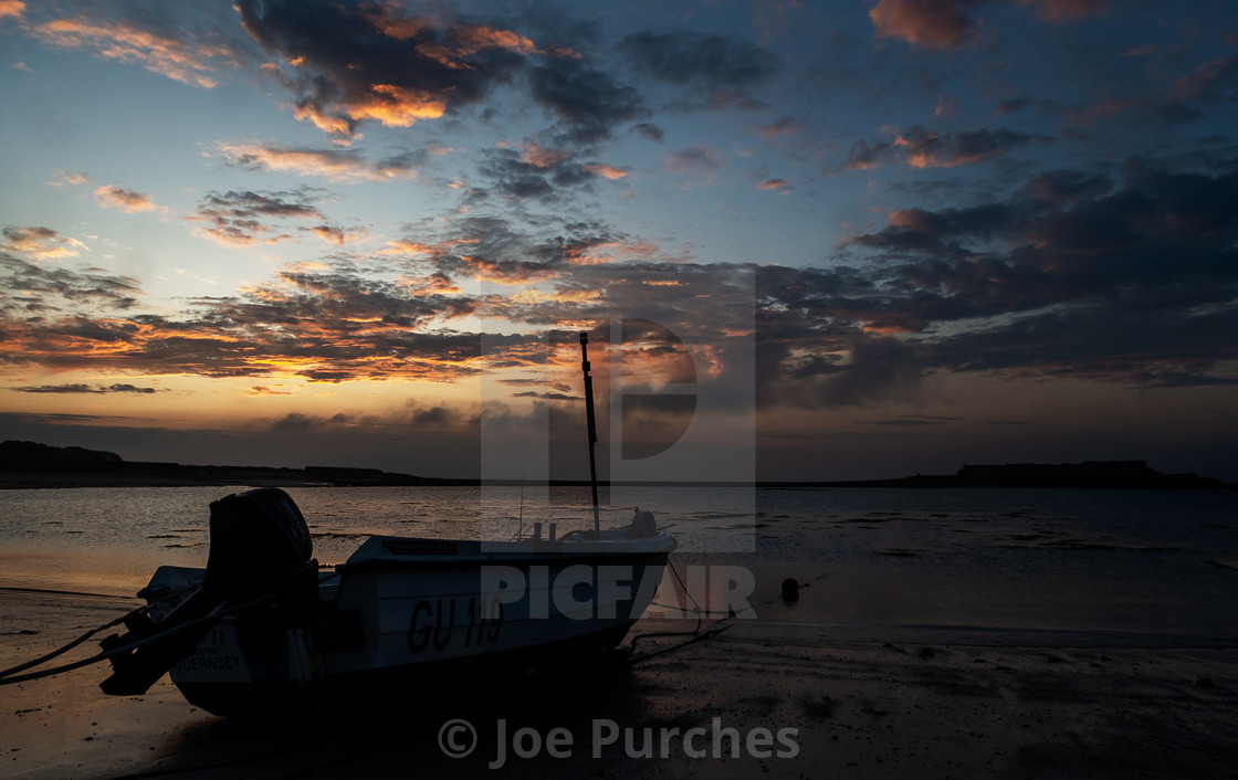 "Dawn at Longis Beach" stock image