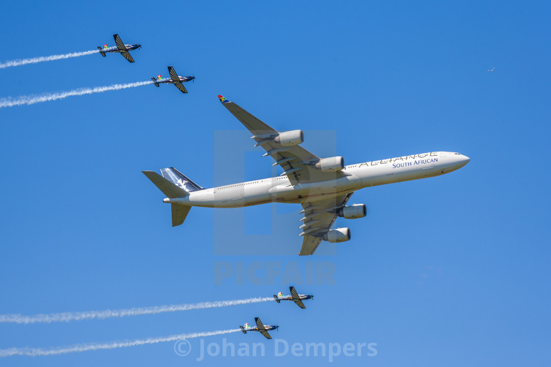 "Commercial Airliner in flight with 4 other planes escorting it" by Johan Dempers - £11.00 "Commercial Airliner in flight with 4 other planes escorting it" stock image