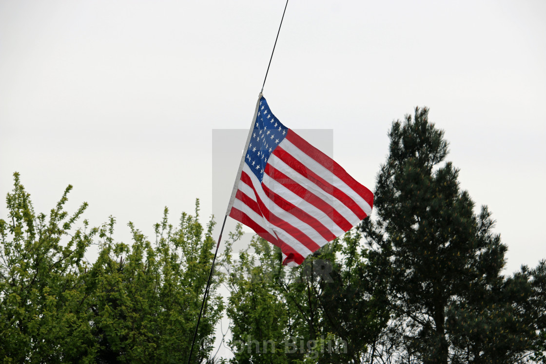 "American national flag on a military vehicle" stock image