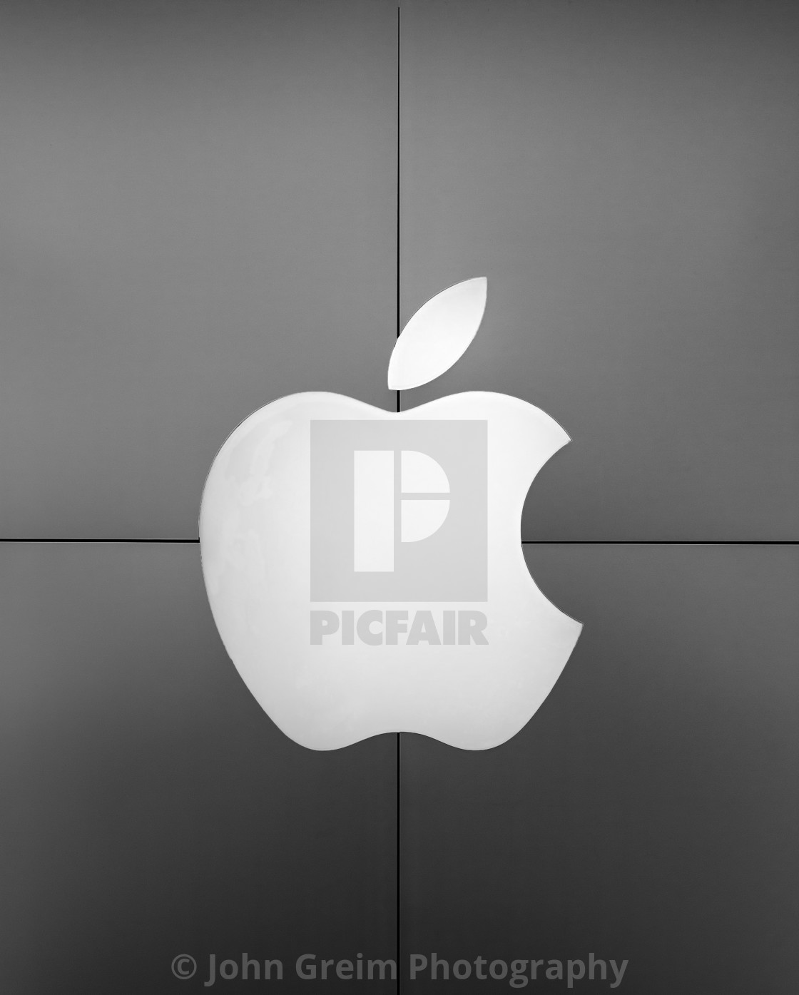 "Exterior of an Apple Store with logo." stock image