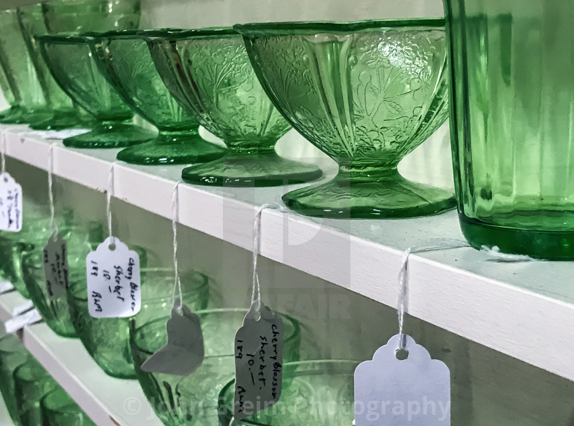 "Thrift shop glassware display" stock image