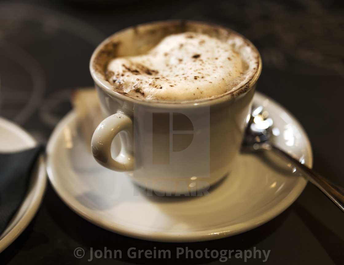 "Hot cappuccino in a cafe" stock image