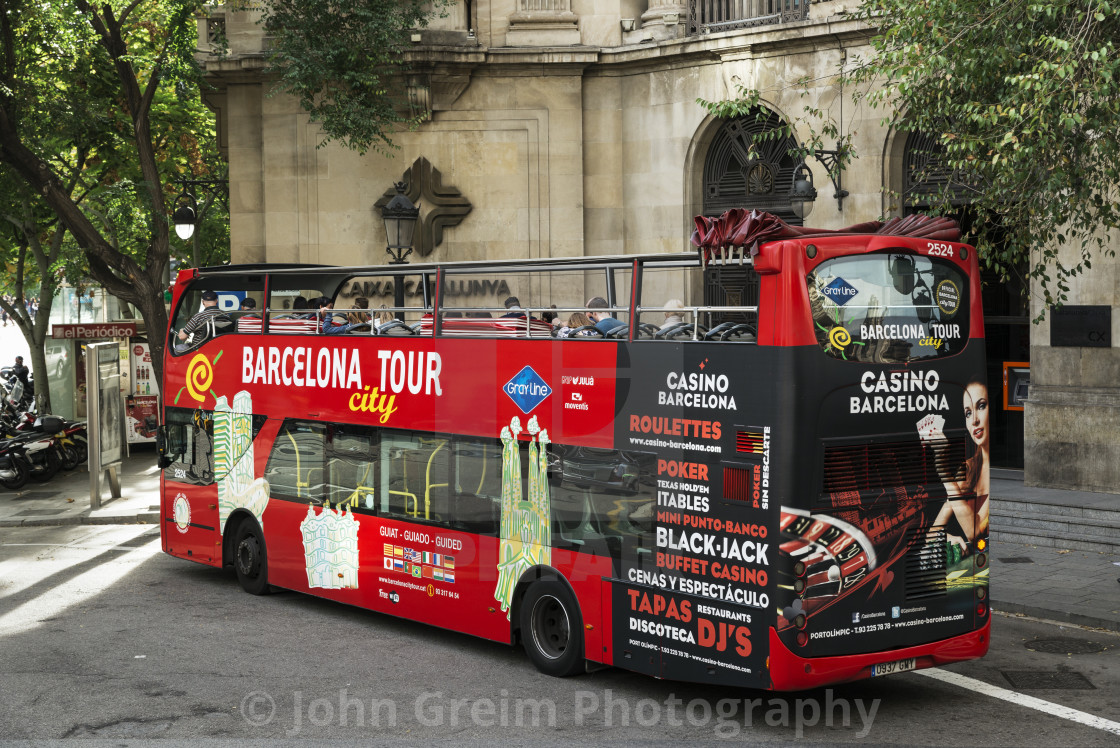 "Barcelona city tour bus" stock image