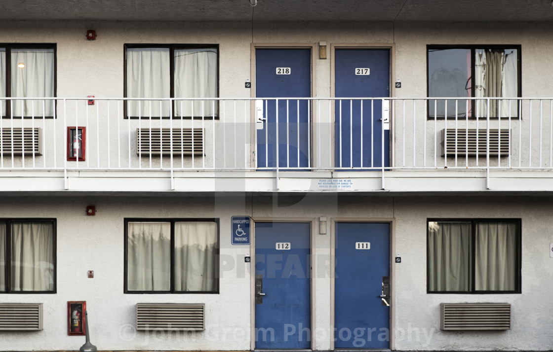 "Budget motel room exterior." stock image