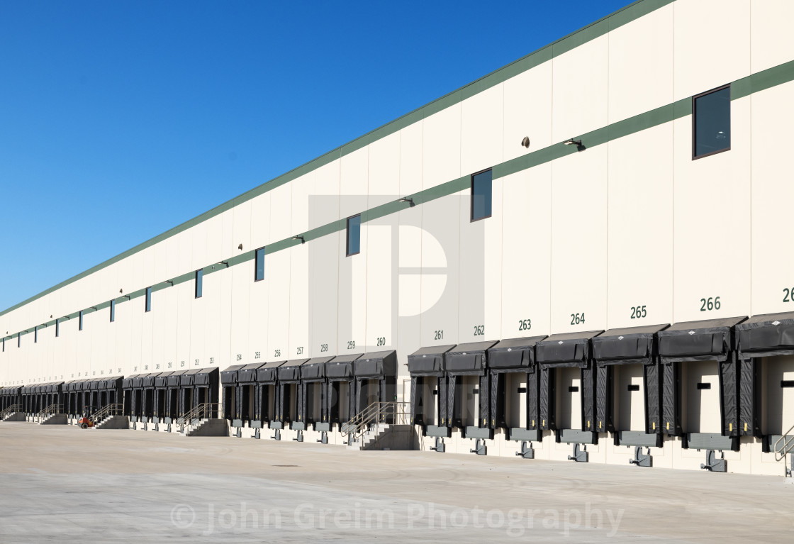 "Truck loading bays at a large warehouse" stock image