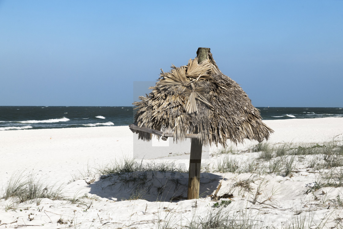 "Rustic beach umbrella at Naples Beach" stock image