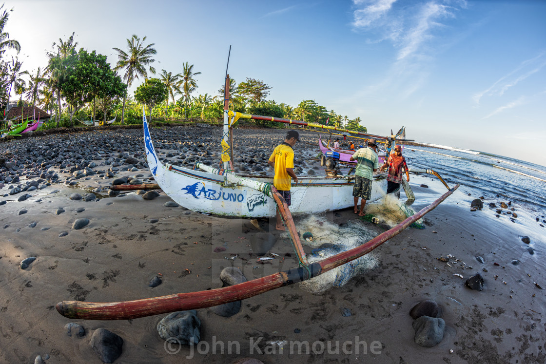 "Bali Fishermen Cleaning Nets" stock image