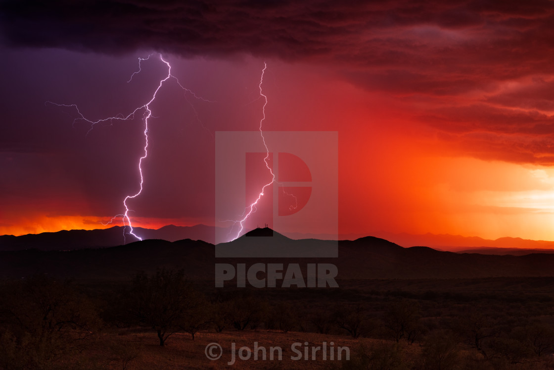 "Lightning from a sunset storm in Arizona" by John Sirlin - $29.56 "Lightning from a sunset storm in Arizona" stock image