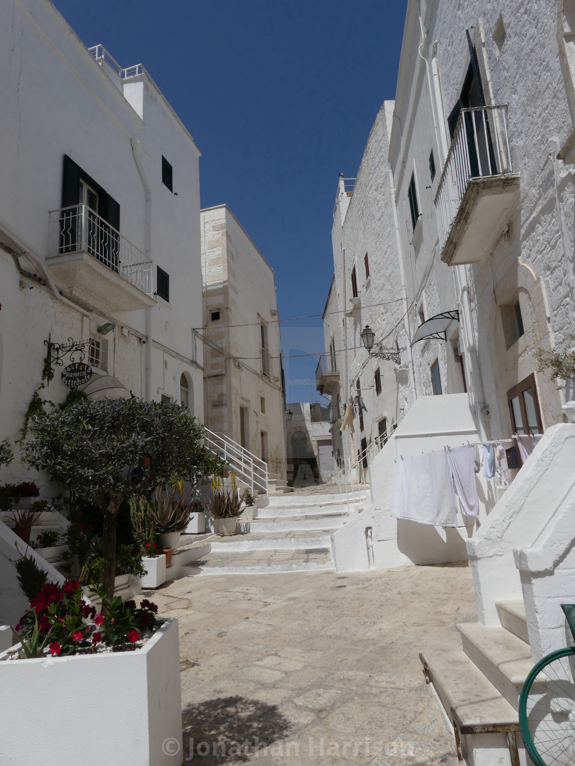 "Small Square and Street, Ostuni, Puglia" by Jonathan Harrison - $12.44 "Small Square and Street, Ostuni, Puglia" stock image