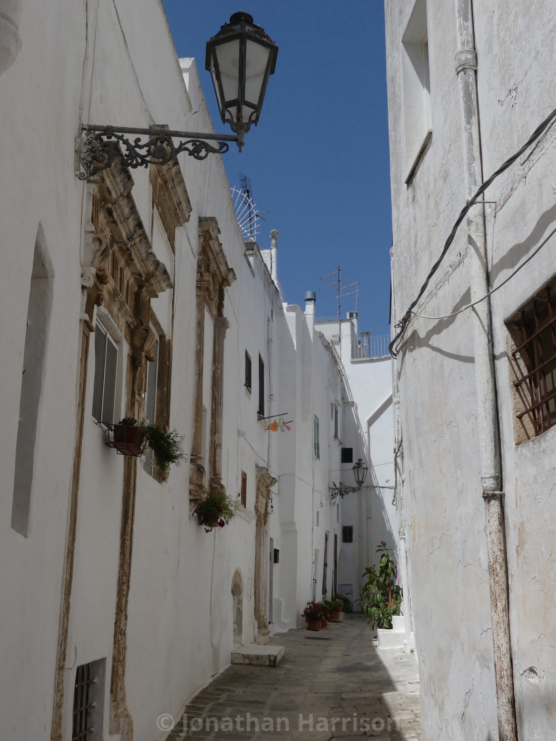 "Typical Side Street, Ostuni, Puglia" by Jonathan Harrison - $12.44 "Typical Side Street, Ostuni, Puglia" stock image