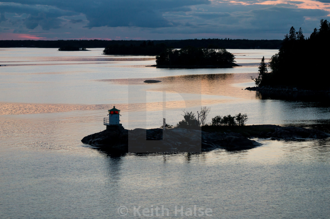 "Lighthouse in Stockholm Archipelago at Sunset" stock image