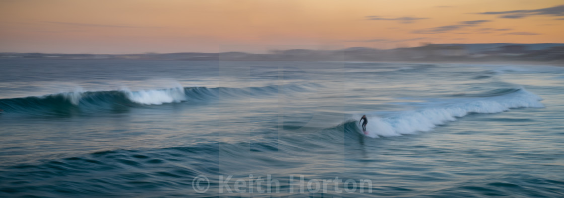 "Lone surfer" stock image