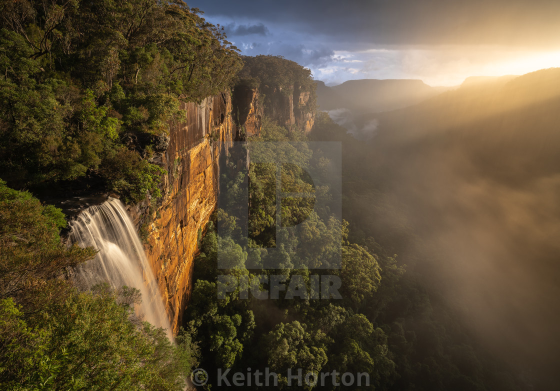 "Sun, rain and fog at Fitzroy Falls" stock image