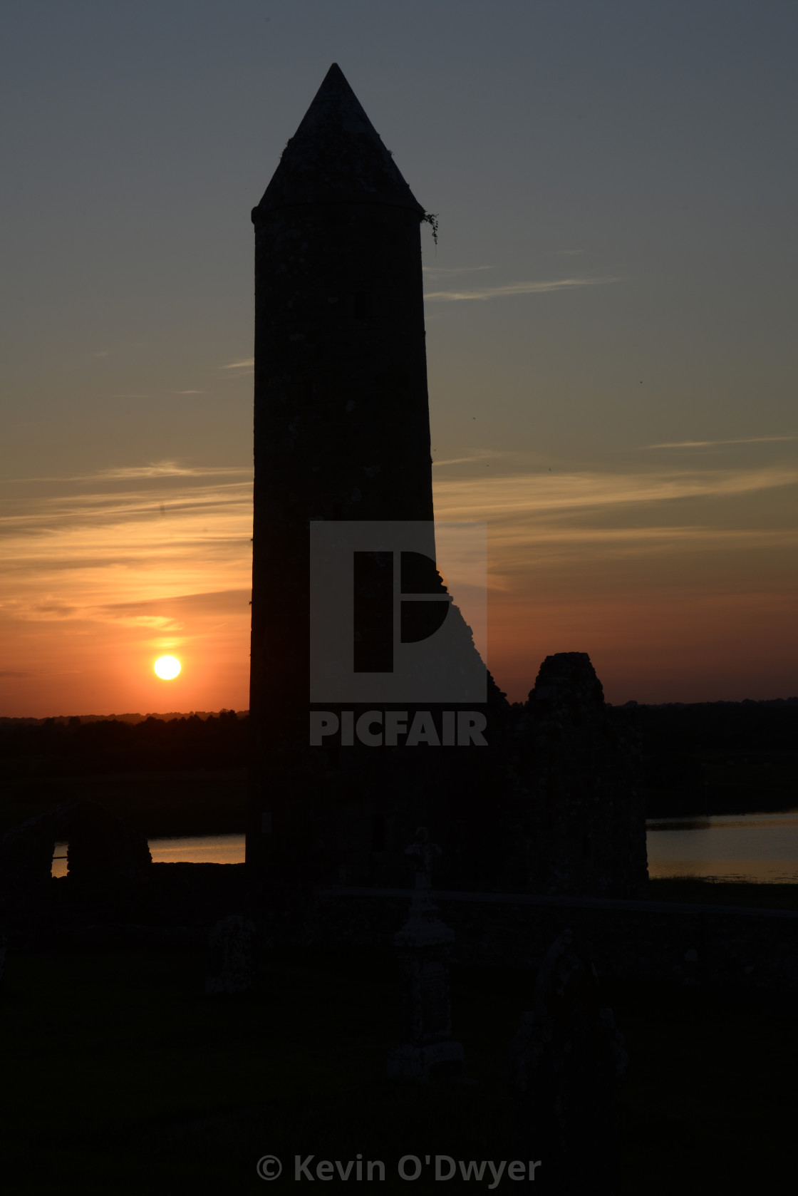 "Round Tower at sunset, Clonmacnoise monastery" stock image