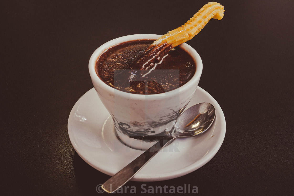 "Churros and chocolate" by Lara Santaella - $43.20 "Churros and chocolate" stock image