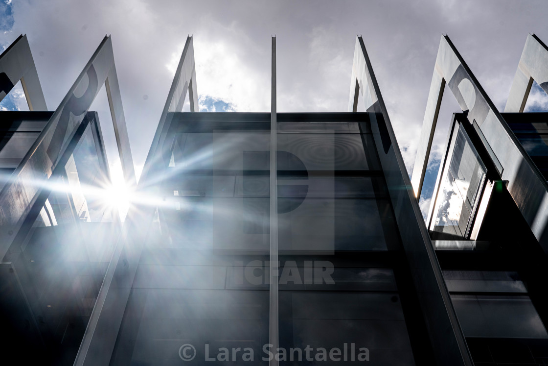 "Sunburst through the arches" stock image