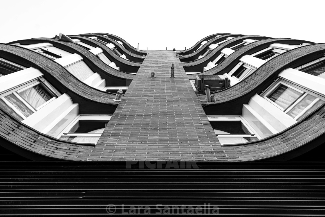 "Waves of bricks" by Lara Santaella - $56.79 "Waves of bricks" stock image