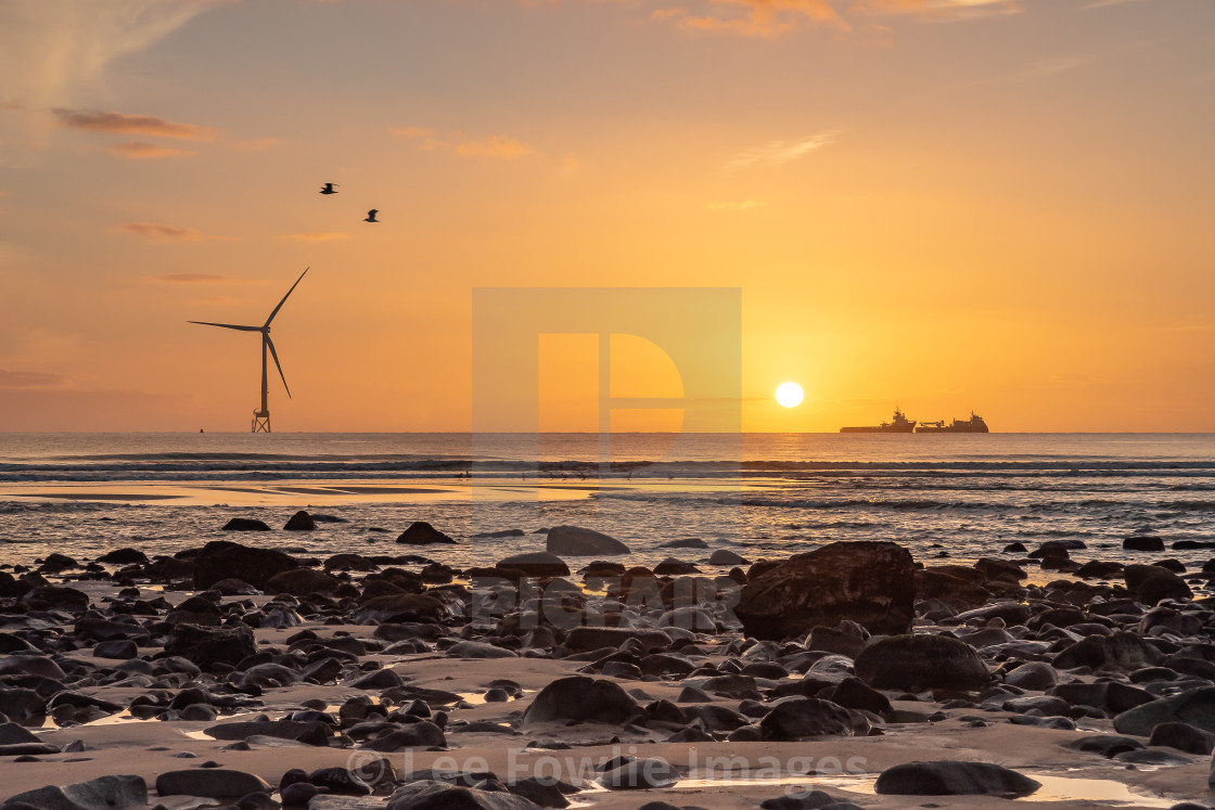 "Sunrise at Blackdog Beach" stock image