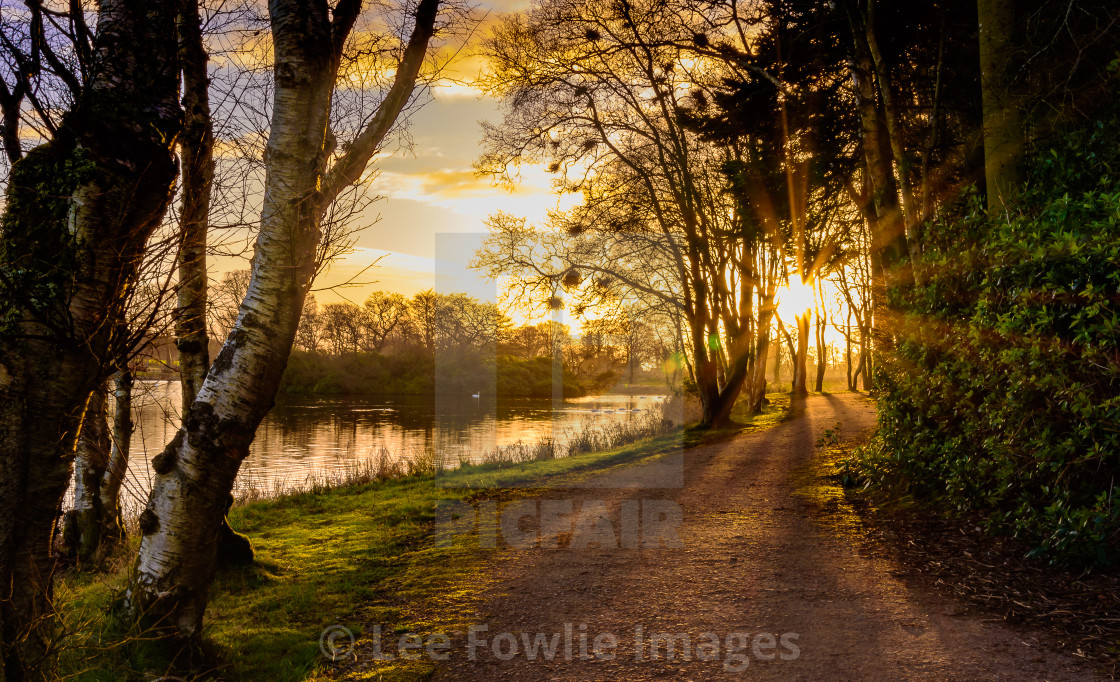 "Sunrise at Pitfour Lake" stock image