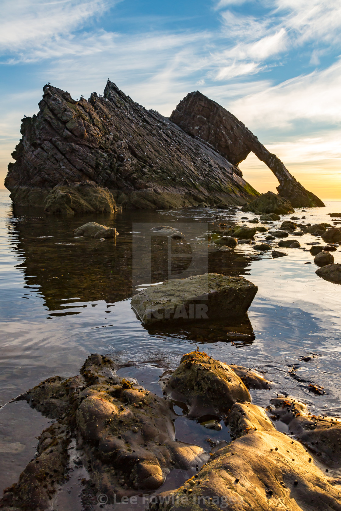 "Morning Light at Bow Fiddle Rock" stock image