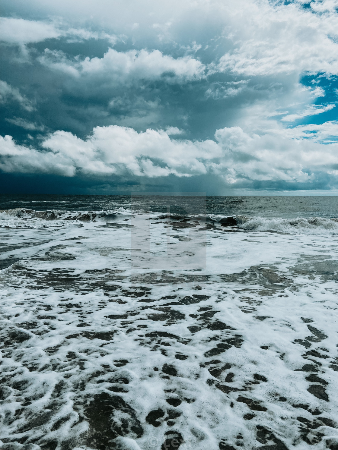 "Clouds and Waves" stock image