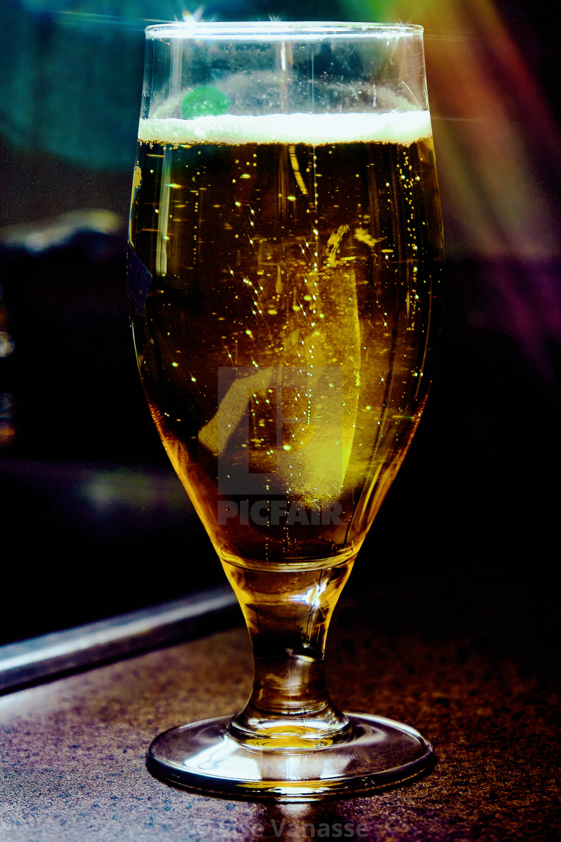 "A glass of beer on foot." by Lise Vanasse - £1.00 "A glass of beer on foot." stock image