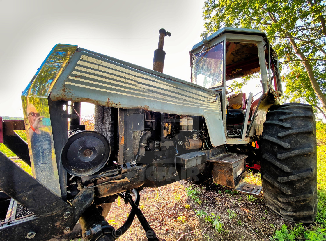 "An old tractor that still works." by Lise Vanasse - £1.00 "An old tractor that still works." stock image