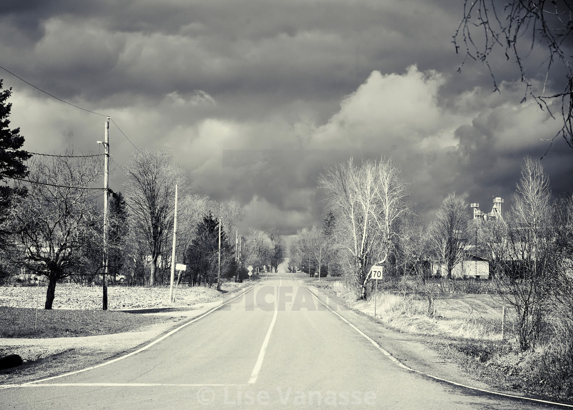 "The road on a cloudy day." by Lise Vanasse - £1.00 "The road on a cloudy day." stock image