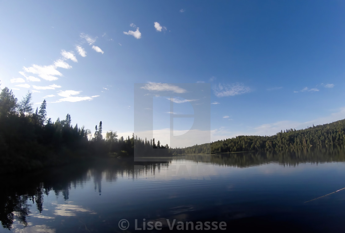 "A small lake that looks like a grown-up." by Lise Vanasse - £1.00 "A small lake that looks like a grown-up." stock image