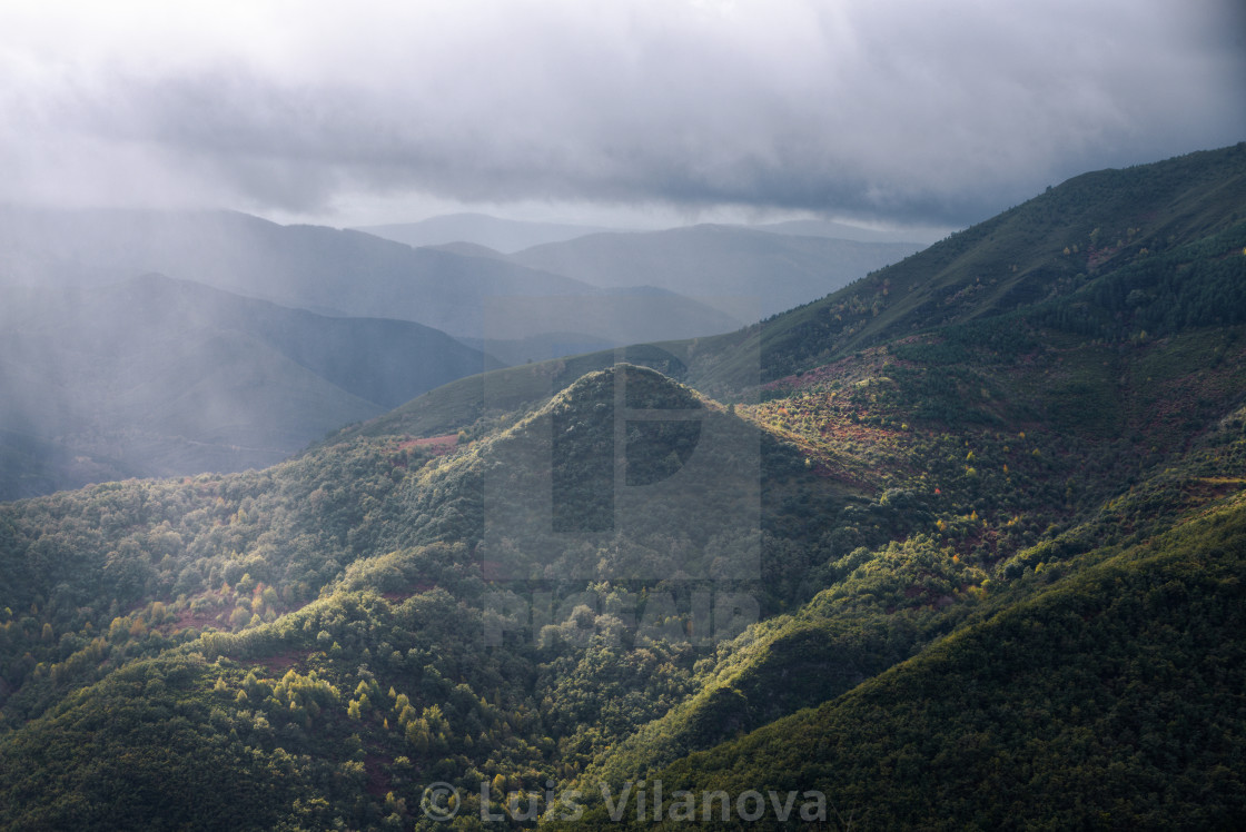 "A wooded pyramidal hill in a clearing of light in the middle of" by Luis Vilanova - $15.31 "A wooded pyramidal hill in a clearing of light in the middle of" stock image