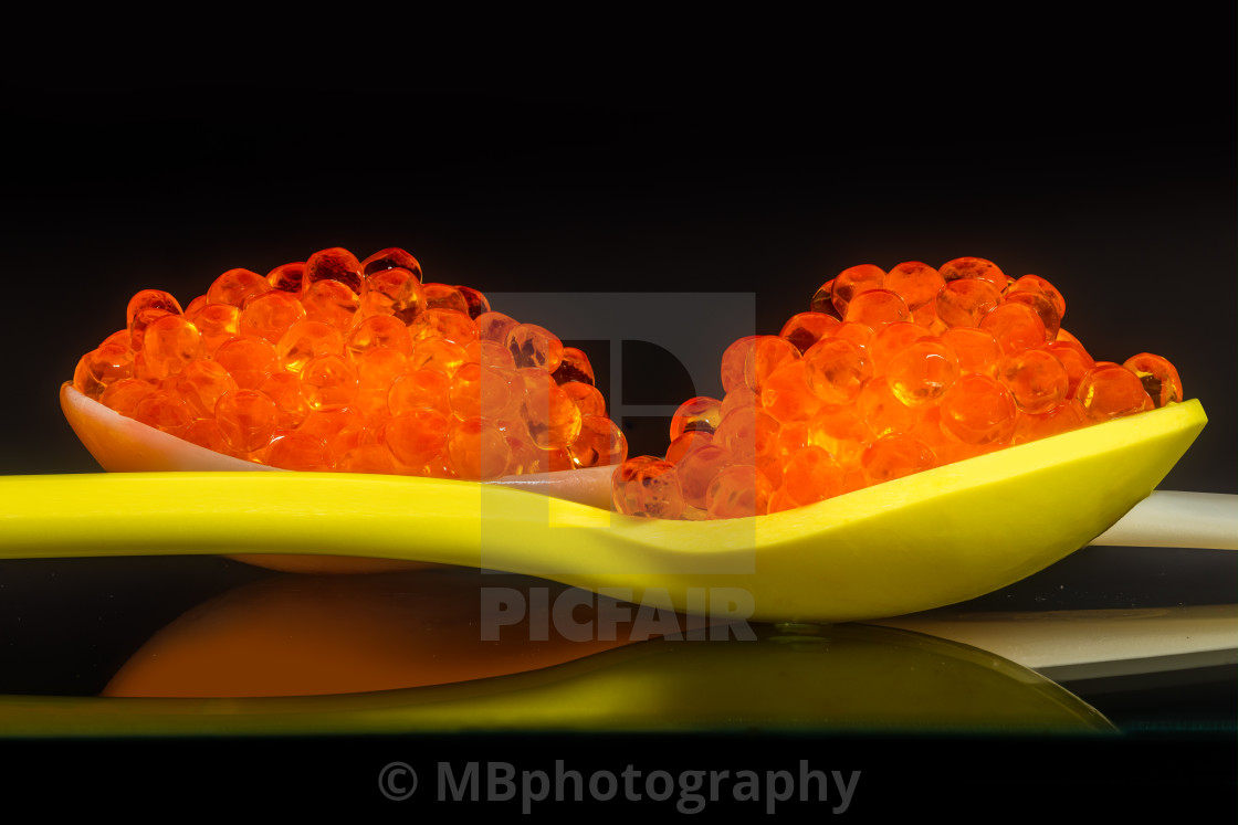 "Fresh salmon caviar on two spoons" stock image