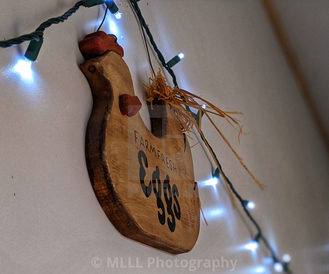 "Wooden chicken with string of lights" stock image