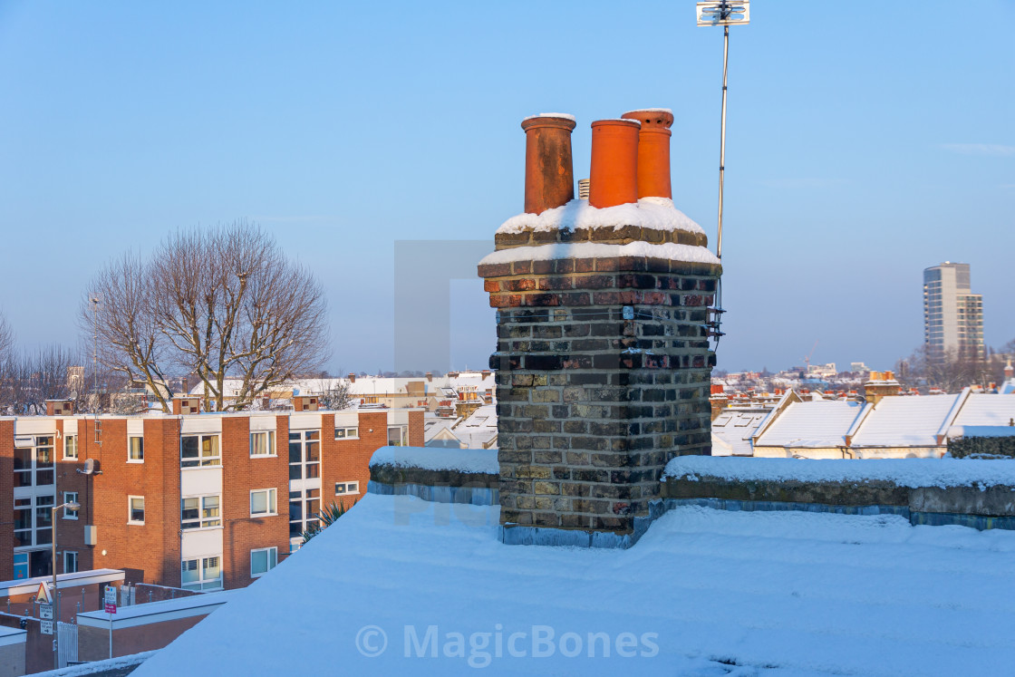 "Chimney pots covered in snow" stock image