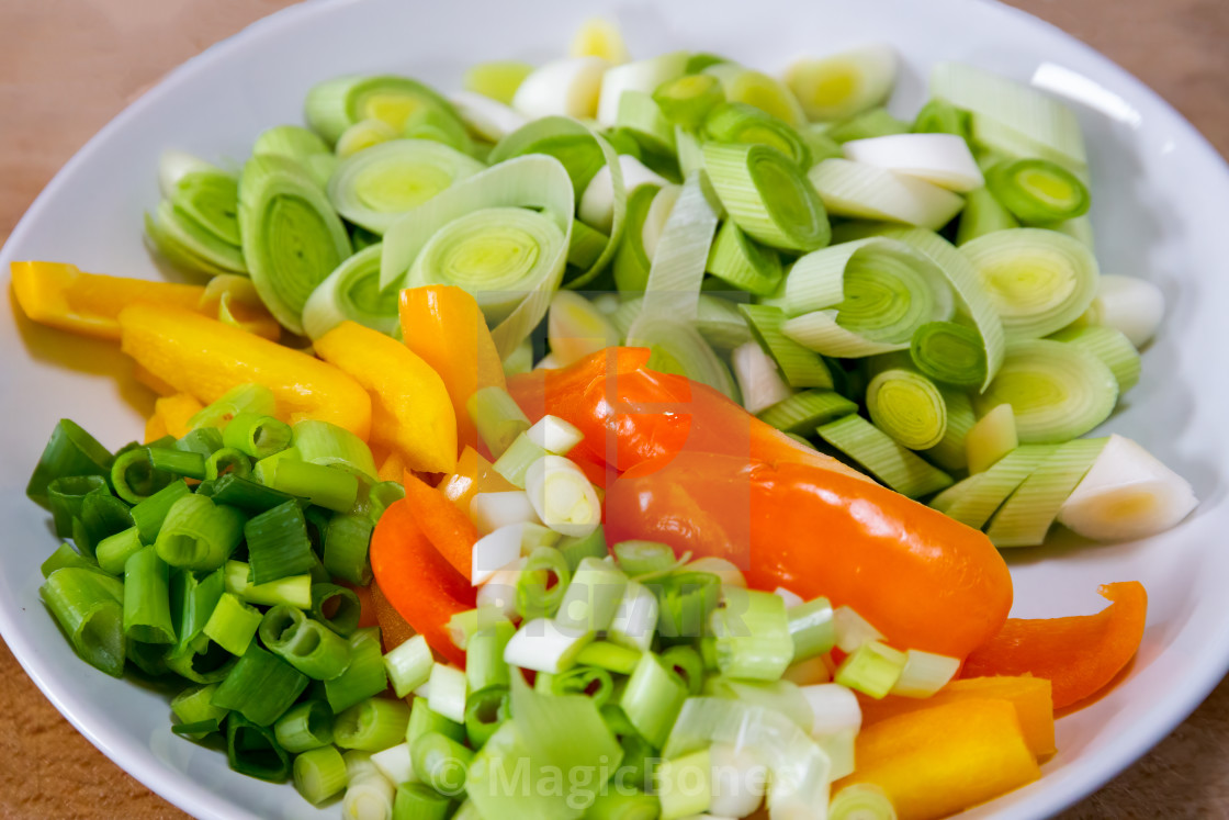 "Sliced leeks, peppers and spring onions" stock image