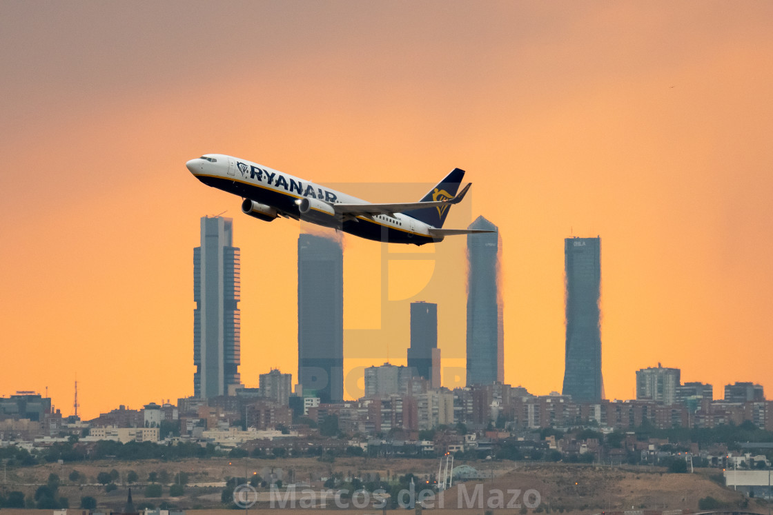 "Ryanair airplane departs from Madrid during a summer storm" by Marcos del Mazo - $46.18 "Ryanair airplane departs from Madrid during a summer storm" stock image