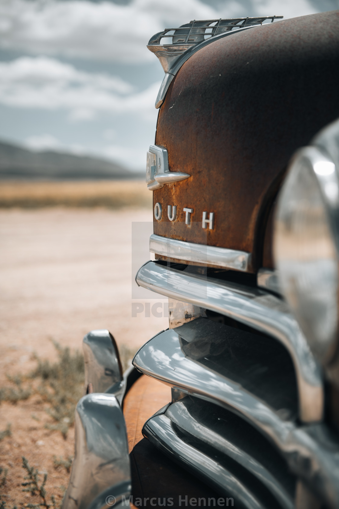 "An old Plymouth in the desert" stock image