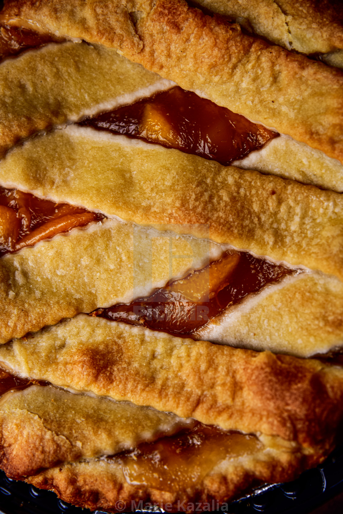 "closeup detail lattice crust on peach pie" by Marie Kazalia - $15.16 "closeup detail lattice crust on peach pie" stock image
