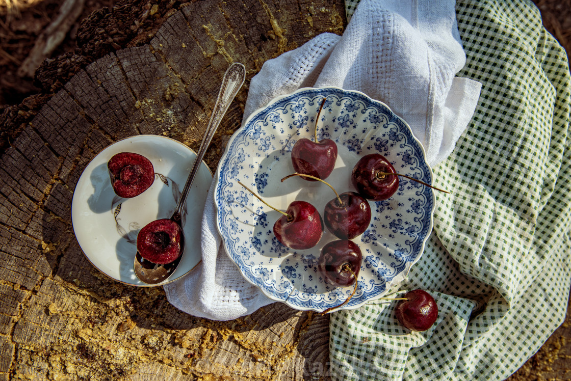 "vintage blue and white bowl with whole ripe red cherries o" by Marie Kazalia - $15.44 "vintage blue and white bowl with whole ripe red cherries o" stock image