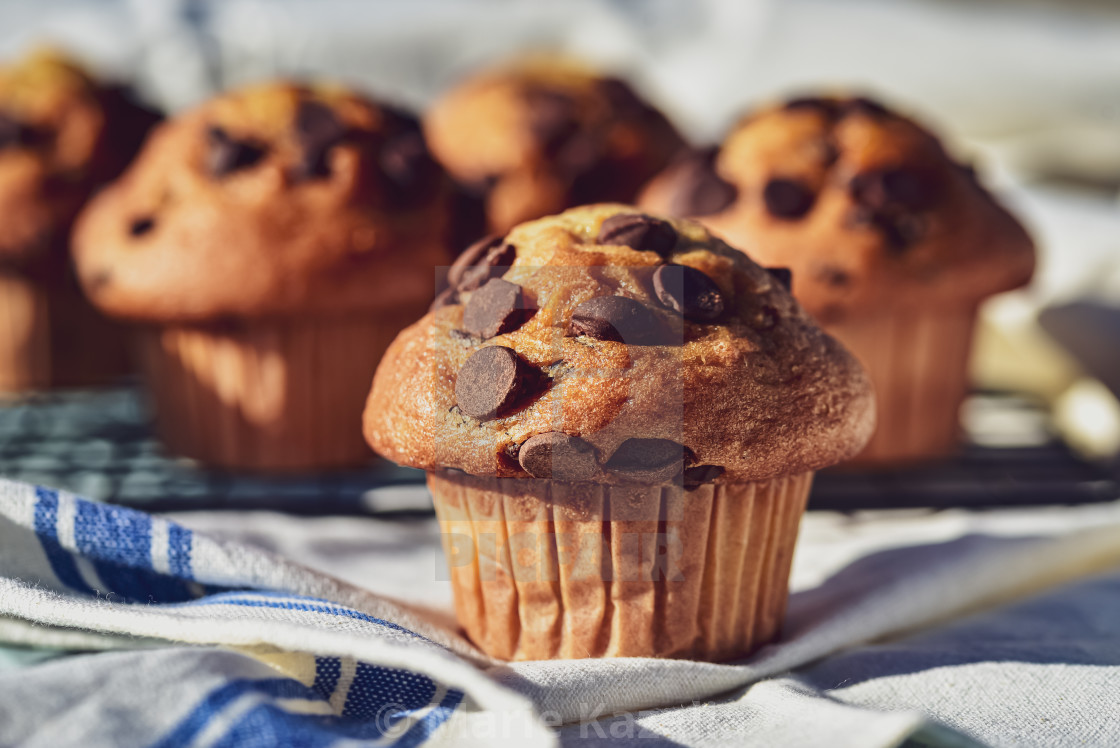 "closeup of chocolate chip muffins on kitchen towel" by Marie Kazalia - $15.44 "closeup of chocolate chip muffins on kitchen towel" stock image