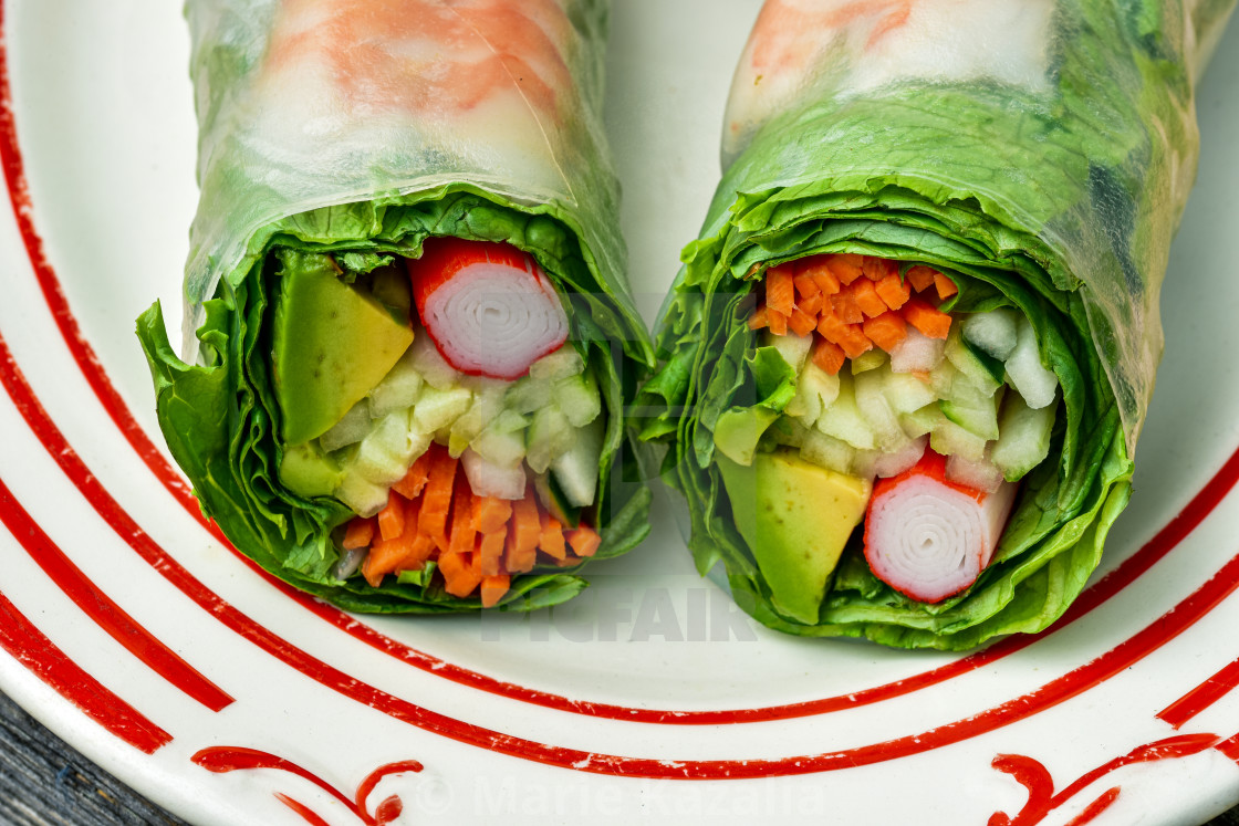 "shrimp Summer rolls wrapped with tapioca paper and green lettuce leaves" by Marie Kazalia - $15.44 "shrimp Summer rolls wrapped with tapioca paper and green lettuce leaves" stock image