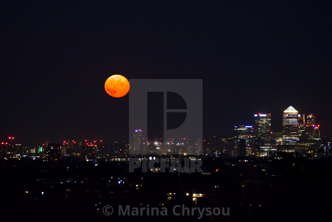 "Supermoon over London, England, UK" stock image